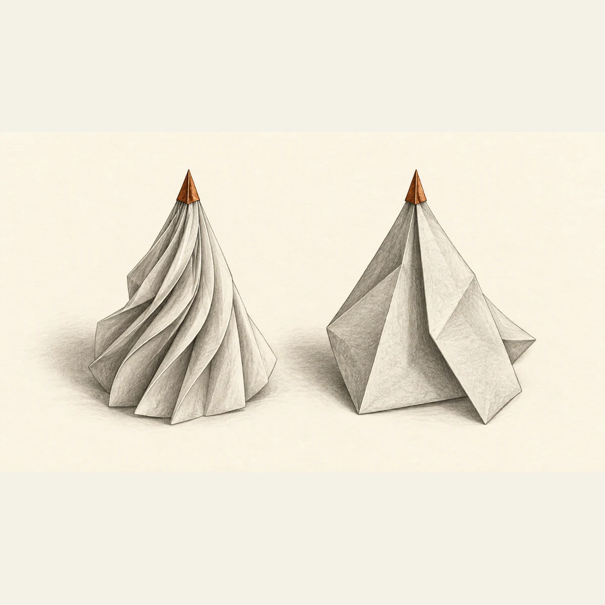 Two graphite-shaded folded paper sculptures stand on warm ivory paper with matching copper pointed tips. The left has many narrow folds; the right has broad angular planes.
